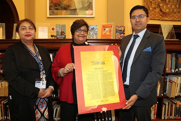 Libraries Director Nikki Crowster and ED Ujala Satgoor standing with Consul General India Mr Abhishek Shukla