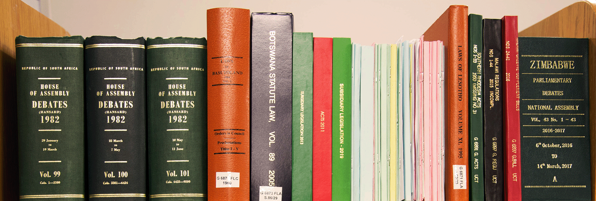 Books with spines showing various volumes various African government publications