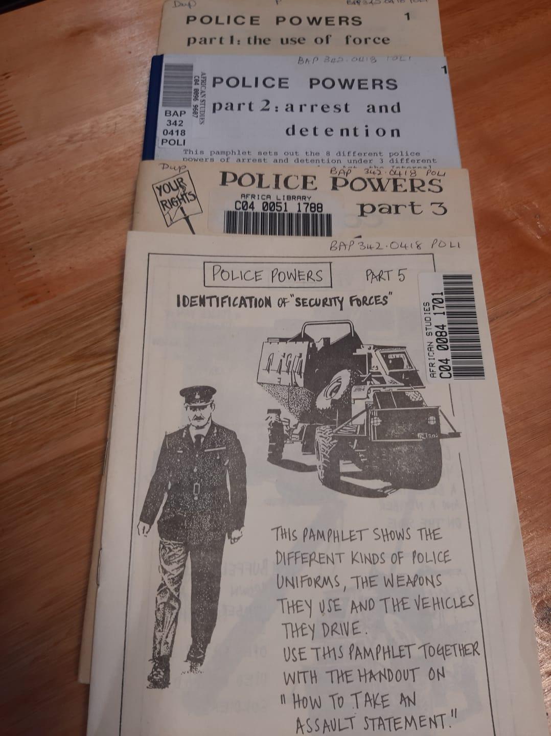 Black and white booklets labelled Police Powers