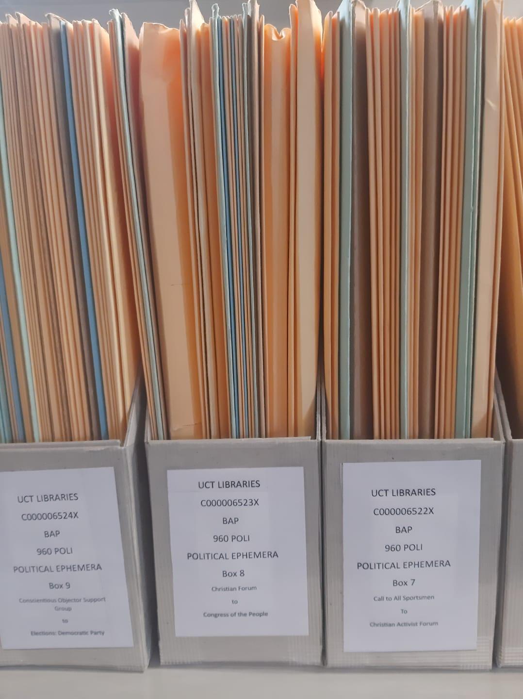 Political Ephemera stacked in magazine holders