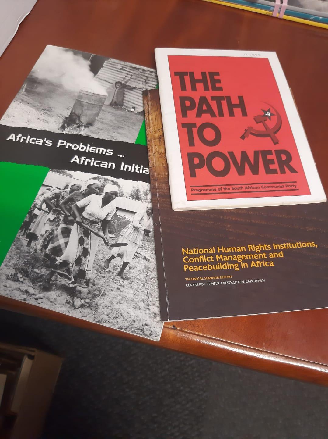 Various political ephemera laid out on table