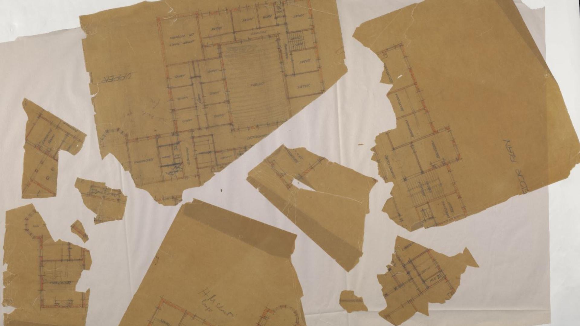 Torn and scattered architectural drawings of 'orphaned items'