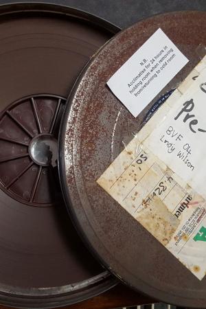 Two film reels, one labelled Crossroads Pre-Mix. Lindy Wilson collection