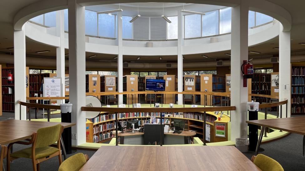View from long table in Music library overlooking the info desk in the sunken circular centre