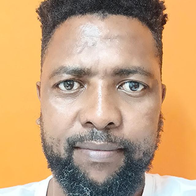 Portrait photo of Patrick Matshoba
