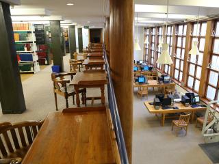 Top view of study desks and PCs inside main reading room of Health Sciences Library